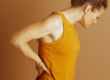Persona con dolor lumbar que limita sus actividades cotidianas.